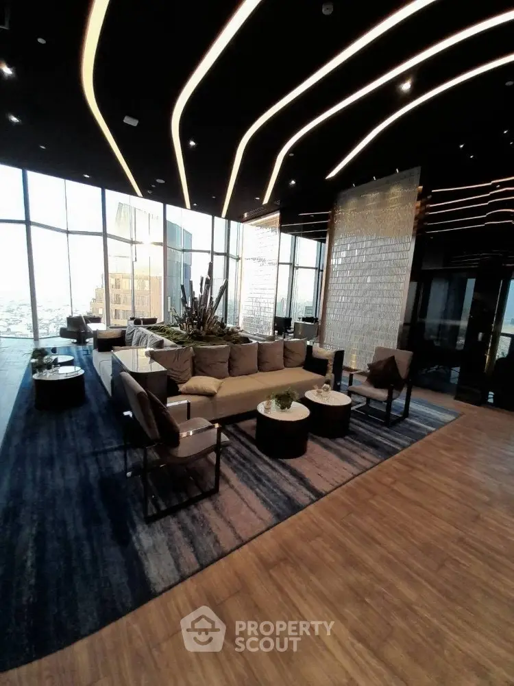 Luxurious modern living room with panoramic city views and elegant lighting design.