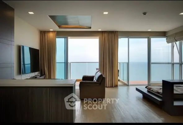 Luxurious living room with ocean view and modern furnishings