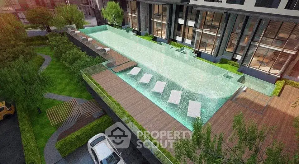 Luxurious apartment complex with stunning rooftop pool and lush garden views.