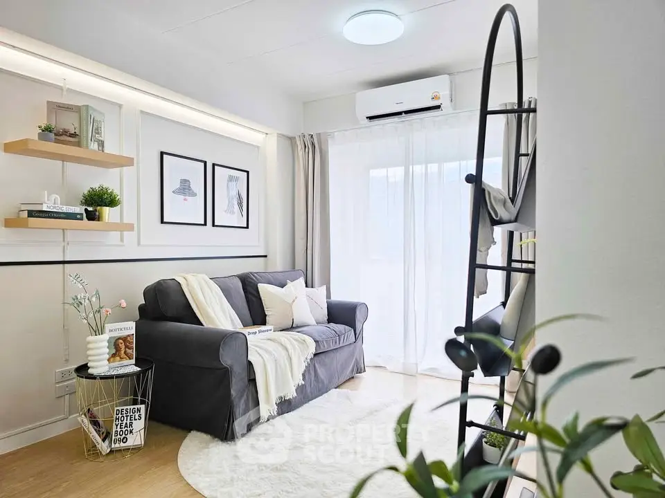 Chic modern living room with cozy sofa, stylish decor, and natural light.