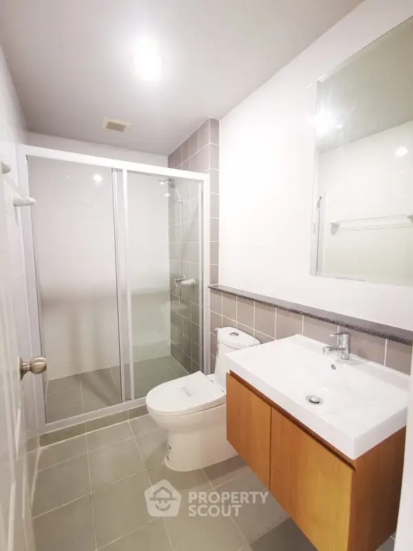 Modern bathroom with sleek shower and contemporary fixtures