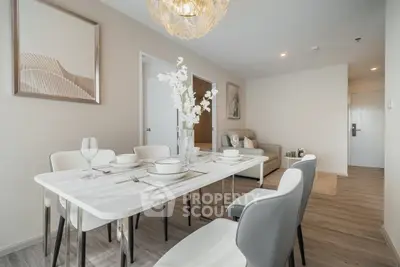 Elegant dining area with modern decor and stylish furniture in a contemporary apartment.