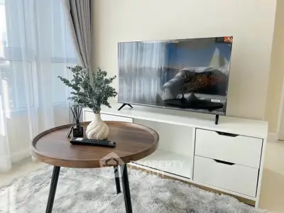 Modern living room with sleek TV stand and stylish decor