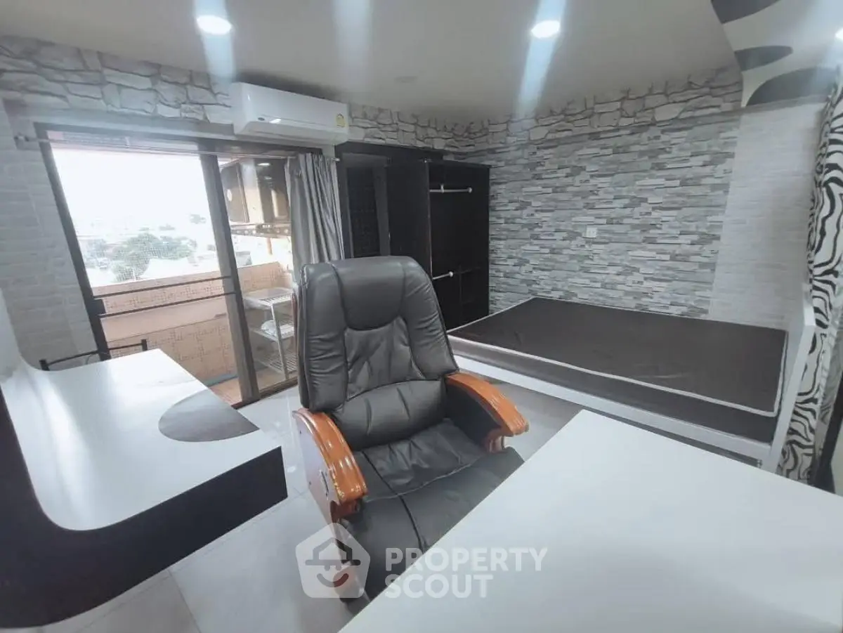 Modern study room with balcony access and stylish decor