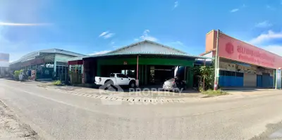 Spacious commercial property with ample parking and road access, ideal for business opportunities.