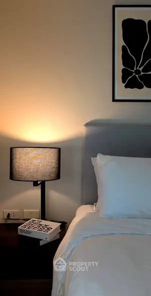 Cozy bedroom with modern decor and soft lighting