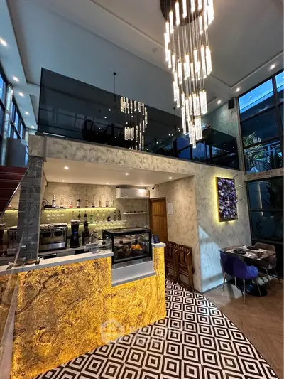 Luxurious modern interior with elegant lighting and stylish decor, perfect for upscale living or dining.