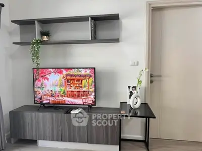 Modern living room with sleek TV stand and decorative shelving