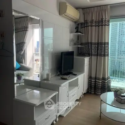 Charming living room with elegant white furniture and city view balcony, perfect for modern urban living.