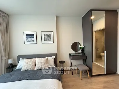 Modern bedroom with ensuite bathroom and stylish decor