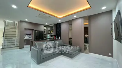 Spacious modern living room with sleek design and cozy sectional sofa