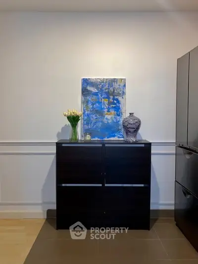 Modern kitchen corner with sleek cabinetry and stylish decor