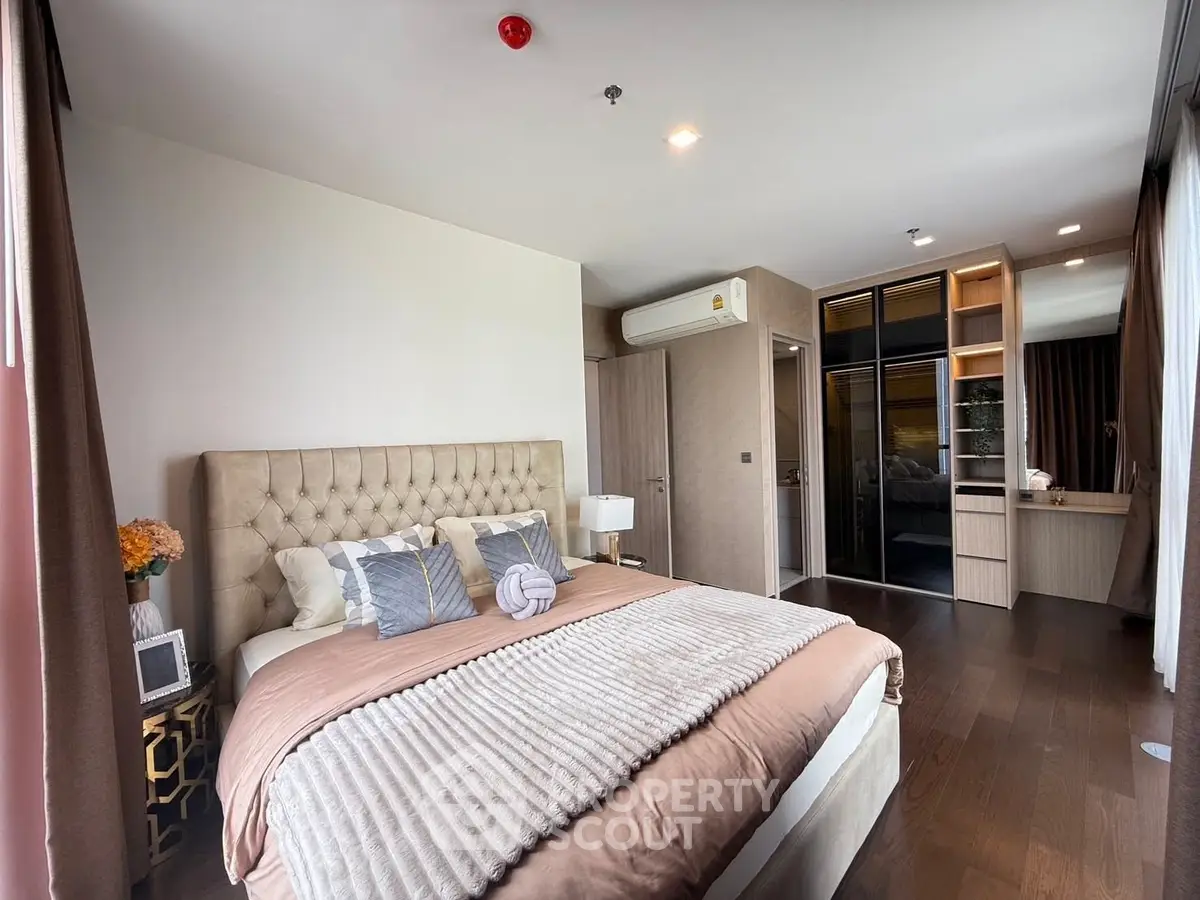 Luxurious bedroom with elegant decor and ample natural light