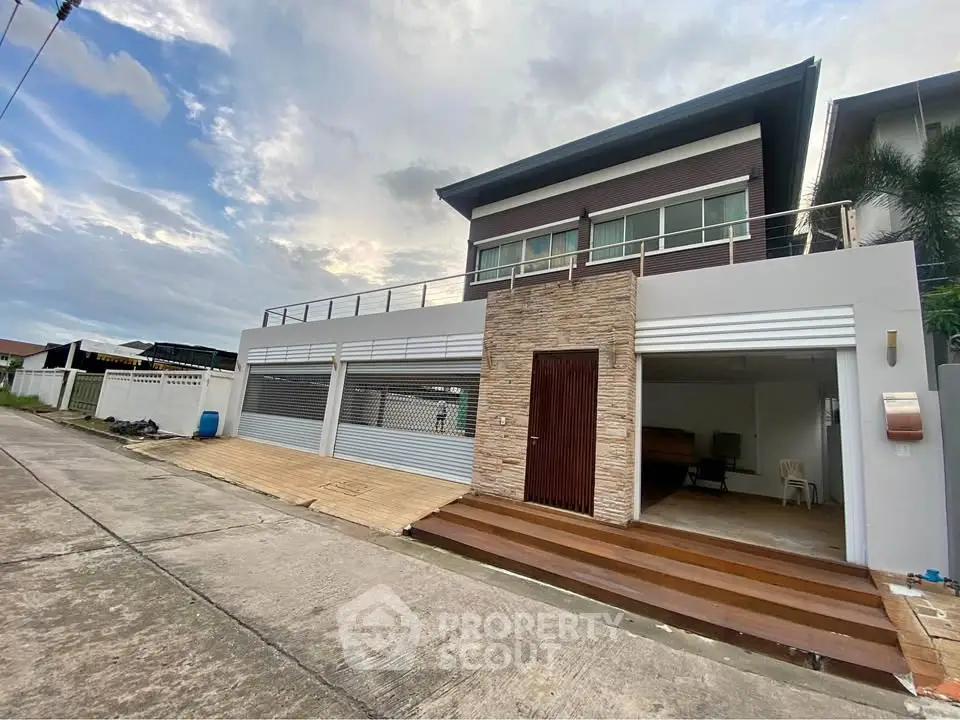 Modern two-story house with spacious garage and contemporary design