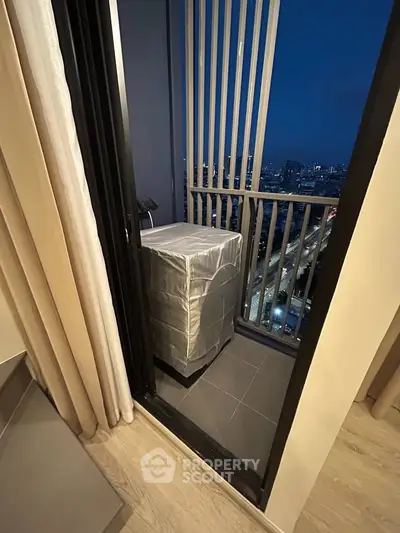 Chic urban balcony with city view, perfect for relaxation and enjoying the skyline.