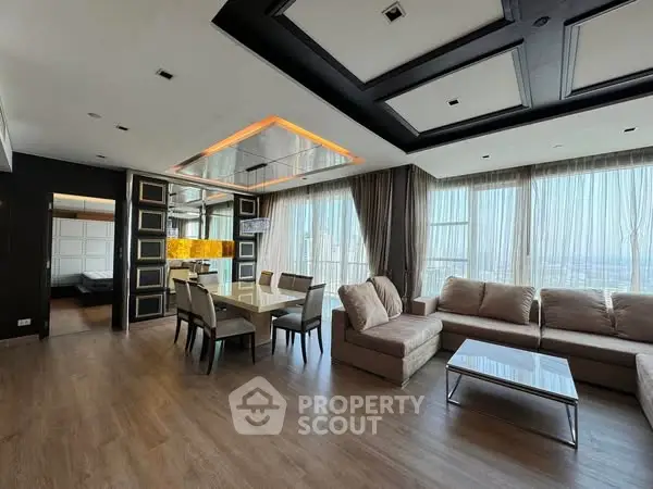 Luxurious modern living room with elegant dining area and panoramic city views.