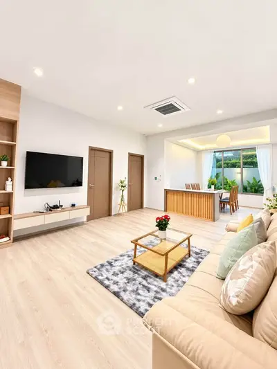 Spacious modern living room with open layout and elegant dining area
