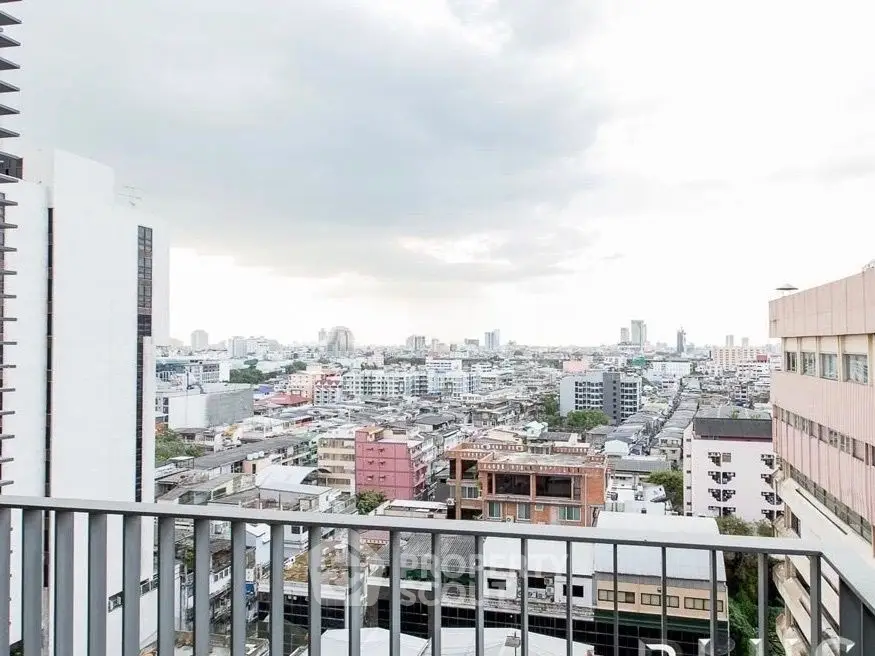Stunning cityscape view from a high-rise balcony, perfect for urban living enthusiasts.