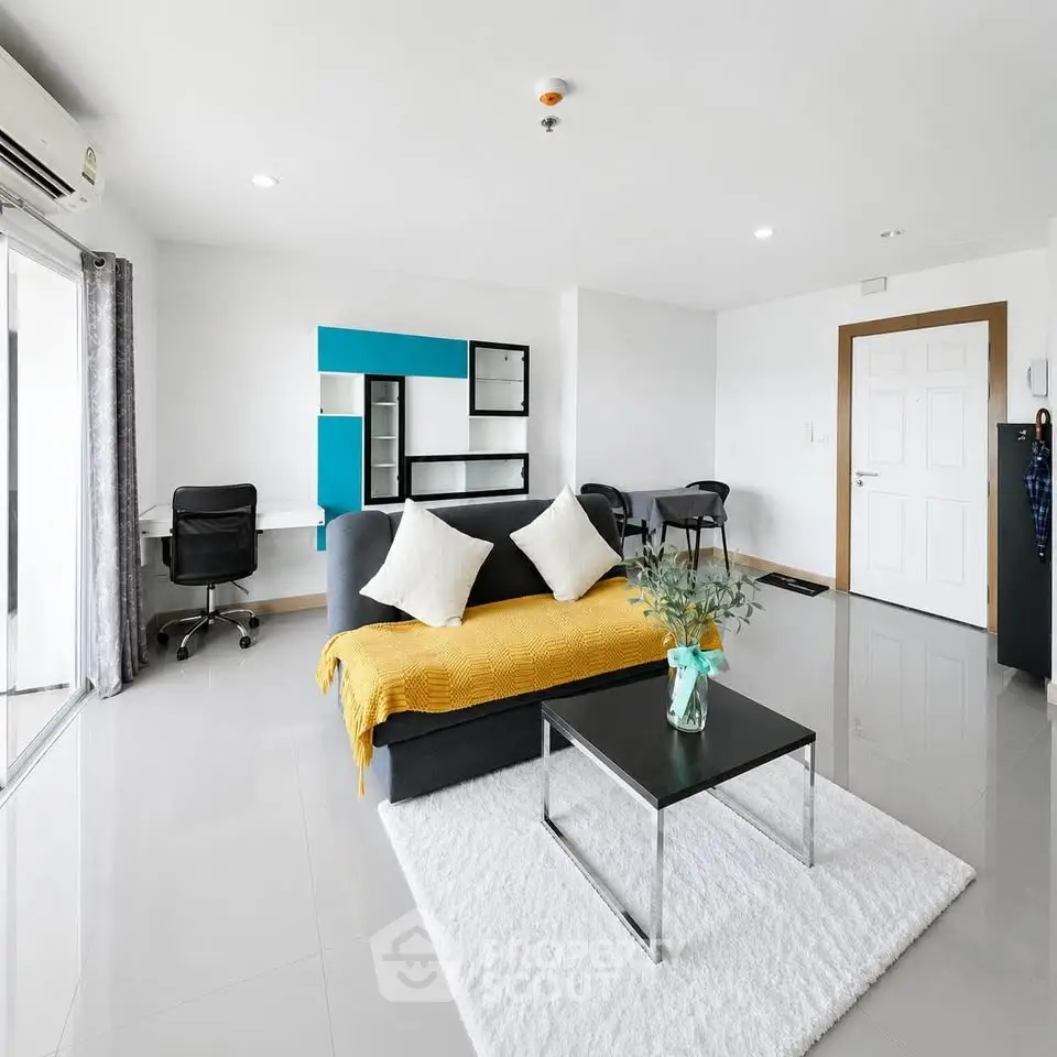 Spacious modern living room with stylish decor and natural light