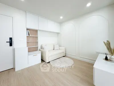 Modern minimalist living room with white sofa and built-in shelves