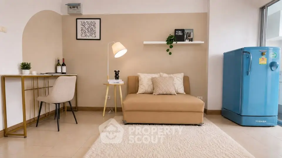 Chic living room with modern decor, cozy seating, and stylish furniture, perfect for urban living.