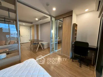 Modern apartment interior with wooden flooring and stylish furniture