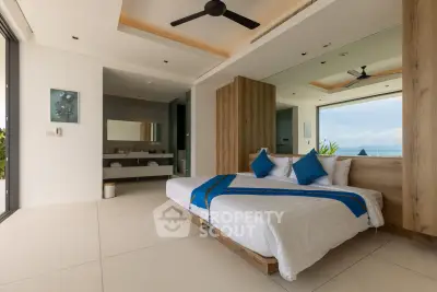 Luxurious modern bedroom with ocean view and elegant decor