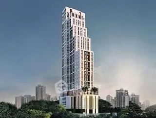 Stunning modern high-rise building with unique architectural design in urban skyline.