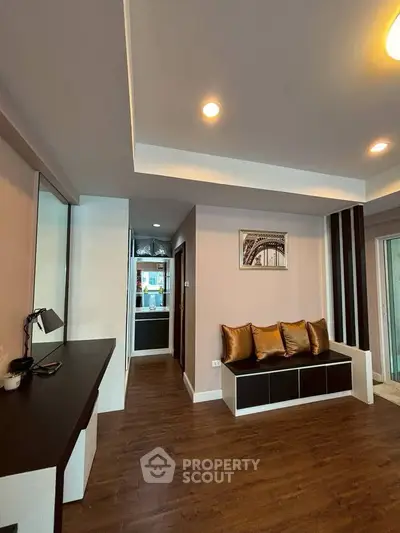 Modern living room with stylish decor and wooden flooring