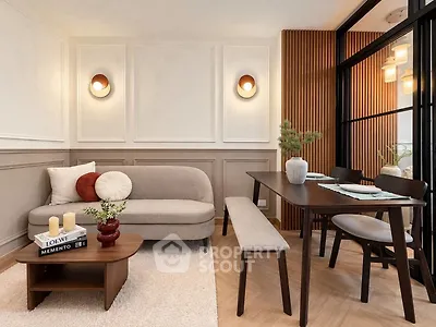 Stylish living and dining area with modern decor and elegant lighting