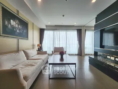 Spacious modern living room with elegant decor and large windows