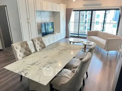 Luxurious modern living room with marble dining table and city view balcony.