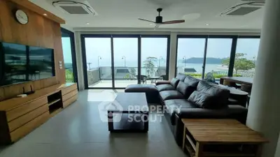 Luxurious living room with stunning ocean view and modern furnishings
