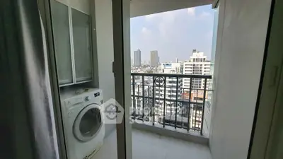Modern high-rise apartment balcony with city view and washing machine