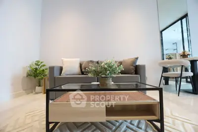 Modern living room with sleek furniture and stylish decor