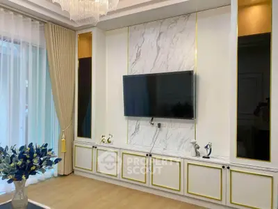 Luxurious living room with elegant marble wall and mounted TV