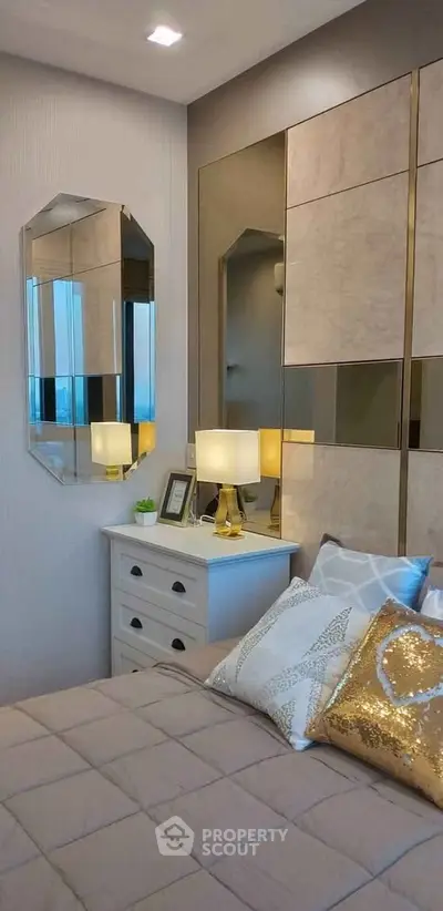 Luxurious bedroom with elegant decor and stylish mirrors