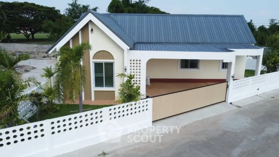 Charming single-story home with modern design and spacious driveway