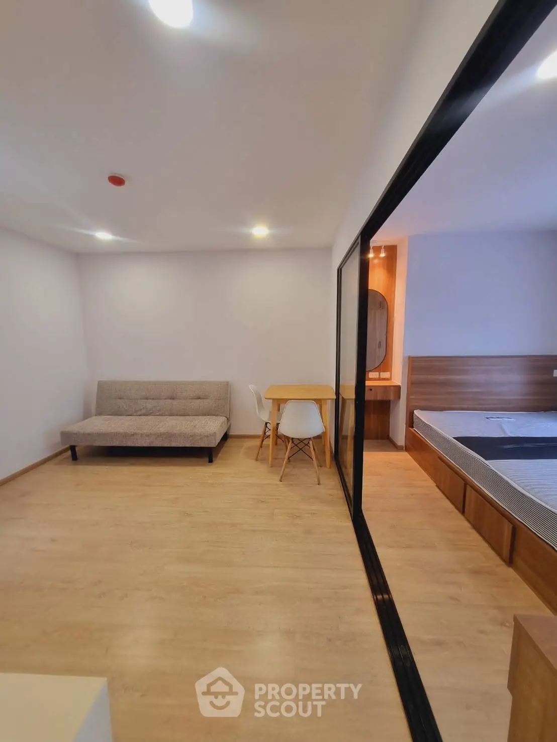 Modern studio apartment with open layout and cozy furnishings