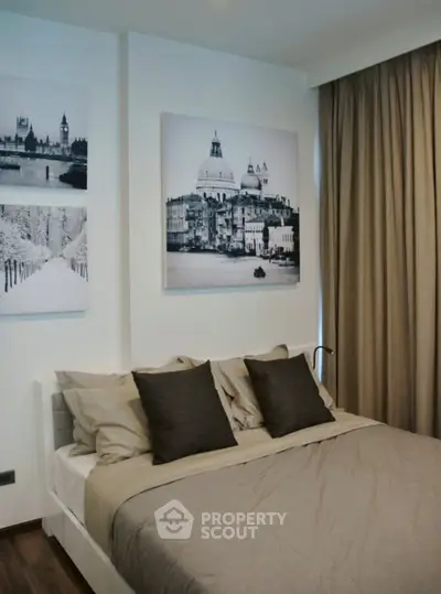 Cozy bedroom with elegant decor and large window curtains