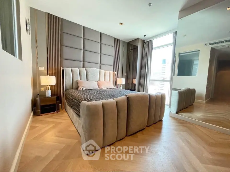 Luxurious modern bedroom with plush bed and stylish decor