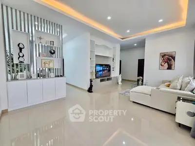 Spacious modern living room with elegant decor and ambient lighting