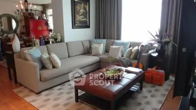 Spacious living room with modern decor and large sectional sofa