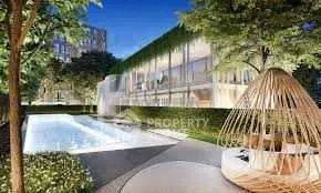 Luxurious modern pool area with lush greenery and stylish seating