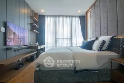 Luxurious modern bedroom with large window and stylish decor