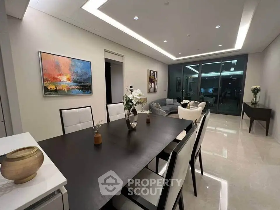 Luxurious modern living room with elegant dining area and stylish decor