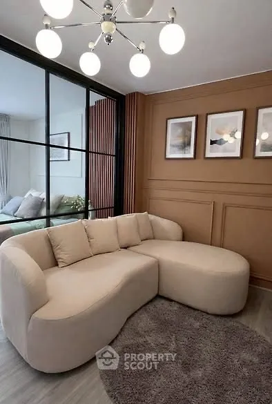 Stylish modern living room with cozy beige sofa and elegant decor