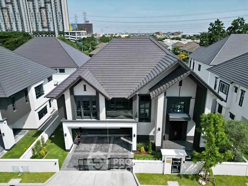 Stunning modern house with sleek design and spacious driveway in a prime urban location.