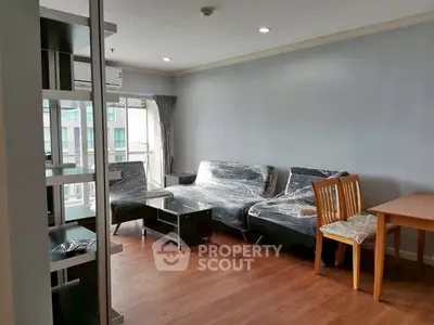 Spacious living room with modern furniture and natural light