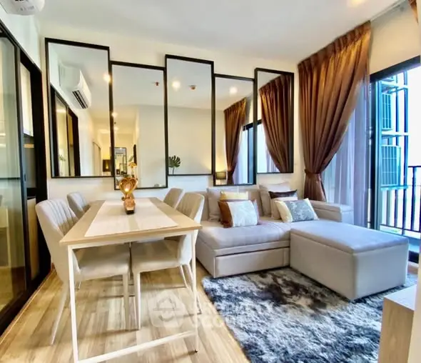 Stylish modern living room with elegant decor and ample natural light